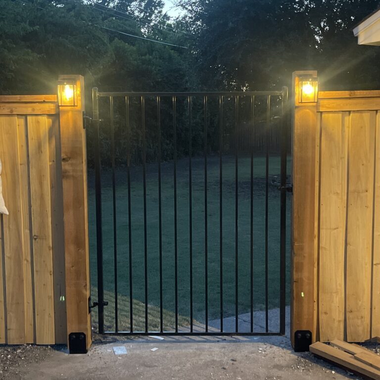 Texas Fence Solutions Waco - iron gate and woof fence